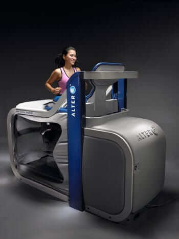 A woman runs in AlterG antigravity treadmill